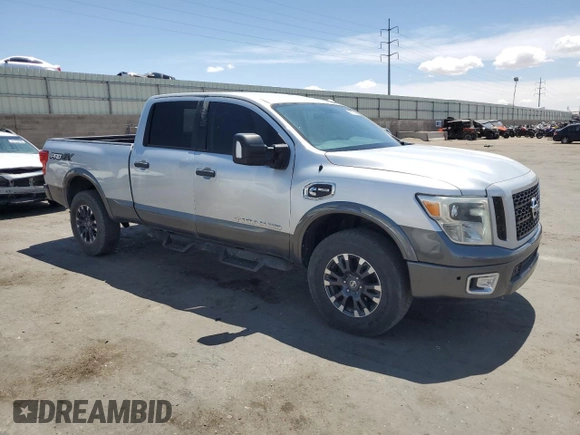 2017 Nissan Titan XD PRO-4X with VIN 1N6BA1F45HN525928, listed as a Copart auction lot 55773415 with 100,295 mi miles and Clean Title. Bid and sale history available at carsss.com. Image 4.