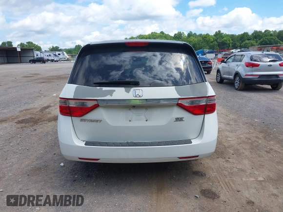 2012 Honda Odyssey EX-L with VIN 5FNRL5H62CB019238, listed as a IAAI auction lot 42524694 with 271,384 mi miles and . Bid and sale history available at DreamBid. Image 16.