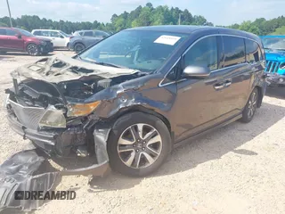 2015 Honda Odyssey Touring Elite with VIN 5FNRL5H95FB127156, listed as a IAAI auction lot 42618059 with 160,074 mi miles and . Bid and sale history available at DreamBid. Image 17.