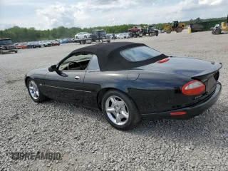 1999 Jaguar XK z VIN SAJGX2044XC031383, wystawiony jako Copart lot #54726925 z przebiegiem 107 696 mil mil oraz Szkody całkowita. Historia ofert i sprzedaży dostępna na DreamBid. Obrazek 2.