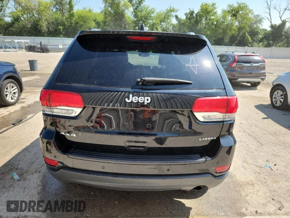 2019 Jeep Grand Cherokee Laredo E с VIN 1C4RJFAG7KC771866, выставлен на аукционе Copart как лот 63876305 с пробегом 119 797 миль миль и Списание • Salvage title. История ставок и продаж доступна на DreamBid. Изображение 6.