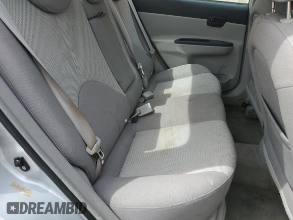 2006 Hyundai Accent GLS with VIN KMHCN46C46U048752, listed as a Copart auction lot 52930035 with 143,688 mi miles and Salvage title. Bid and sale history available at DreamBid. Image 10.