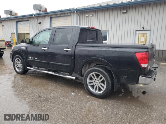2012 Nissan Titan S with VIN 1N6AA0EC3CN305453, listed as a Copart auction lot 83468454 with 79,440 mi miles and Salvage Title. Bid and sale history available at carsss.com. Image 2.