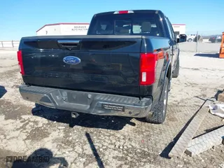 2018 Ford F-150 XL with VIN 1FTEW1E53JKE63853, listed as a IAAI auction lot 41392315 with 69,422 mi miles. Bid and sale history available at carsss.com. Image 4.