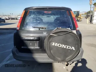 2000 Honda CR-V LX with VIN JHLRD2848YC006656, listed as a Copart auction lot 84562074 with 230,352 mi miles and Salvage Title. Bid and sale history available at carsss.com. Image 6.