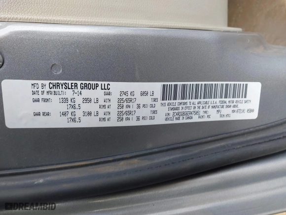 2014 Dodge Grand Caravan SE with VIN 2C4RDGBG6ER475051, listed as a IAAI auction lot 41857218 with 230,842 mi miles. Bid and sale history available at carsss.com. Image 9.