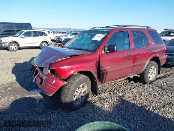 2002 Isuzu Rodeo with VIN 4S2DM58W624335632, listed as a IAAI auction lot 41690735 with 186,480 mi miles and . Bid and sale history available at DreamBid. Image 18.