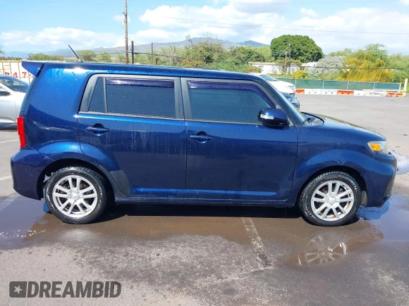 2014 Scion xB with VIN JTLZE4FE6EJ057604, listed as a IAAI auction lot 41528031 with 48,403 mi miles. Bid and sale history available at carsss.com. Image 13.