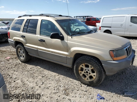 2000 Jeep Grand Cherokee Laredo with VIN 1J4GW48S6YC304447, listed as a Copart auction lot 58001035 with Not provided miles and Clean title. Bid and sale history available at DreamBid. Image 4.
