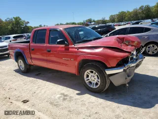2002 Dodge Dakota SLT with VIN 1B7HL48N02S587177, listed as a Copart auction lot 48901935 with 207,550 mi miles and Salvage Title. Bid and sale history available at carsss.com. Image 4.
