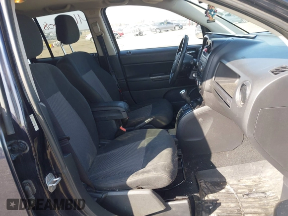 2011 Jeep Compass with VIN 1J4NT1FA7BD208658, listed as a IAAI auction lot 41795085 with 198,880 mi miles. Bid and sale history available at carsss.com. Image 5.