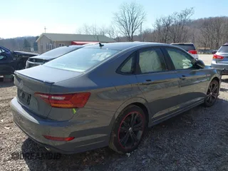 2019 Volkswagen Jetta GLI S with VIN 3VW5T7BU0KM168191, listed as a IAAI auction lot 41796885 with 79,192 mi miles and . Bid and sale history available at DreamBid. Image 4.