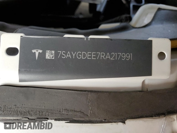 2024 Tesla Model Y Long Range z VIN 7SAYGDEE7RA217991, wystawiony jako Copart lot #50885695 z przebiegiem Nie podano mil oraz Szkoda całkowita • Salvage title. Historia ofert i sprzedaży dostępna na DreamBid. Obrazek 16.
