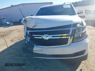 2015 Chevrolet Tahoe LT with VIN 1GNSCBKC0FR104096, listed as a IAAI auction lot 41679298 with 231,005 mi miles and . Bid and sale history available at DreamBid. Image 12.