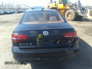 2016 Volkswagen Jetta Sedan 1.4T SE with VIN 3VWD67AJXGM242539, listed as a IAAI auction lot 38948493 with 121,876 mi miles. Bid and sale history available at carsss.com. Image 16.