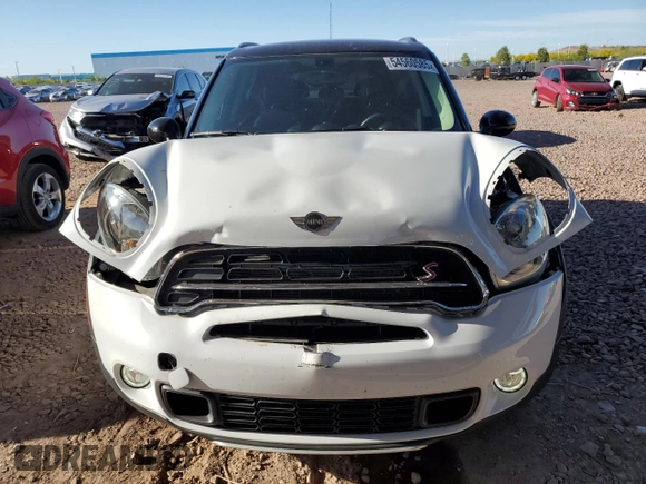 2015 MINI Countryman S with VIN WMWZC5C53FWP44388, listed as a Copart auction lot 54560585 with 67,913 mi miles and Salvage Title. Bid and sale history available at DreamBid. Image 5.
