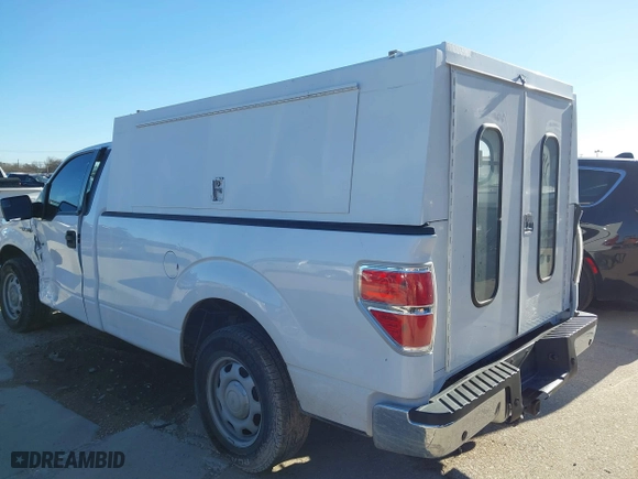 2014 Ford F-150 XL with VIN 1FTMF1CM0EKG22856, listed as a IAAI auction lot 41677979 with 158,580 mi miles. Bid and sale history available at carsss.com. Image 3.