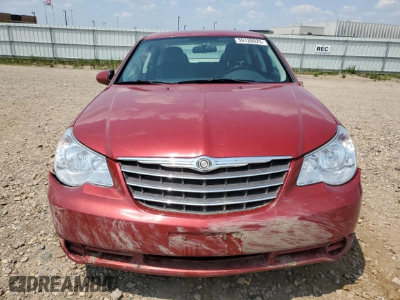 2010 Chrysler Sebring Limited with VIN 1C3CC5FD1AN197099, listed as a Copart auction lot 59128825 with 85,736 mi miles and Salvage title. Bid and sale history available at DreamBid. Image 5.
