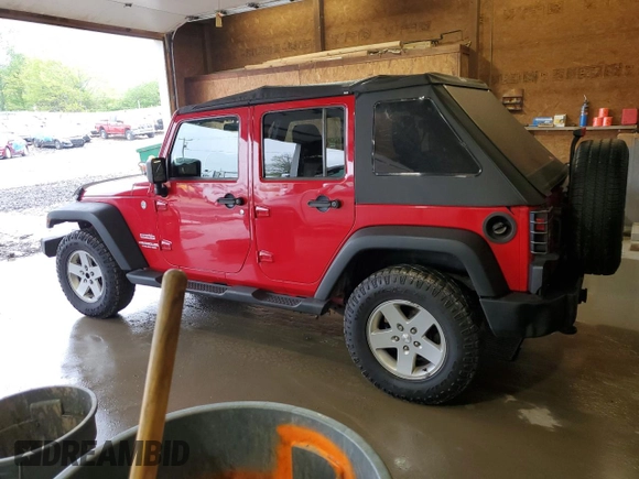 2012 Jeep Wrangler Unlimited Sport z VIN 1C4HJWDG2CL117124, wystawiony jako Copart lot #57288435 z przebiegiem 134 860 mil mil oraz Czysty tytuł • Clean title. Historia ofert i sprzedaży dostępna na DreamBid. Obrazek 2.