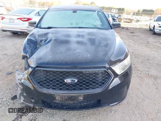 2014 Ford Police Interceptor z VIN 1FAHP2MK3EG124483, wystawiony jako IAAI lot #41018811 z przebiegiem 200 626 mil mil oraz . Historia ofert i sprzedaży dostępna na DreamBid. Obrazek 12.