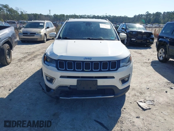 2018 Jeep Compass Limited with VIN 3C4NJCCB5JT407057, listed as a IAAI auction lot 41773636 with 92,272 mi miles and . Bid and sale history available at DreamBid. Image 12.