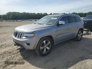 2015 Jeep Grand Cherokee Overland z VIN 1C4RJFCG8FC640996, wystawiony jako Copart lot #55654845 z przebiegiem 48 726 mil mil oraz Szkoda całkowita • Salvage title. Historia ofert i sprzedaży dostępna na DreamBid. Obrazek 1.