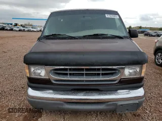 2000 Ford Econoline Cargo Recreational with VIN 1FDRE14LXYHA39870, listed as a Copart auction lot 41824065 with 112,028 mi miles and Salvage title. Bid and sale history available at DreamBid. Image 5.