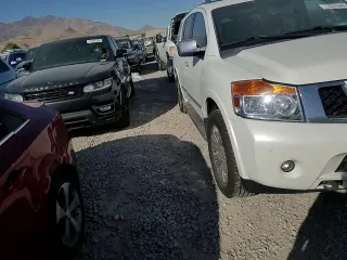 2015 Nissan Armada Platinum z VIN 5N1AA0NCXFN616784, wystawiony jako Copart lot #73331944 z przebiegiem 187 771 mil mil oraz Szkoda całkowita • Salvage title. Historia ofert i sprzedaży dostępna na DreamBid. Obrazek 12.