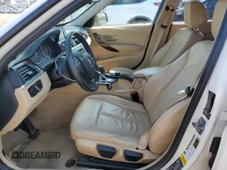 2013 BMW 3 Series 320i xDrive with VIN WBA3C3C5XDF980169, listed as a Copart auction lot 52717675 with 119,297 mi miles and Salvage title. Bid and sale history available at DreamBid. Image 7.