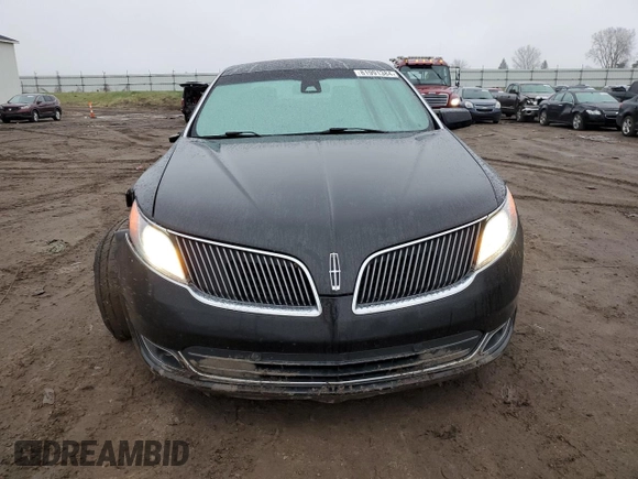 2015 Lincoln MKS with VIN 1LNHL9DK7FG606935, listed as a Copart auction lot 81991384 with 82,097 mi miles and Salvage Title. Bid and sale history available at carsss.com. Image 5.