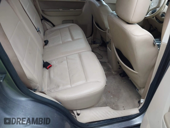 2010 Ford Escape Limited z VIN 1FMCU9EGXAKA70120, wystawiony jako IAAI lot #42330489 z przebiegiem 179 604 mil mil oraz . Historia ofert i sprzedaży dostępna na DreamBid. Obrazek 8.