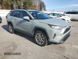 2020 Toyota RAV4 XLE Premium with VIN 2T3C1RFV6LW059183, listed as a Copart auction lot 85281574 with 91,402 mi miles and Salvage Title. Bid and sale history available at carsss.com. Image 4.