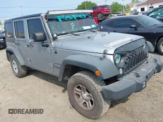 2014 Jeep Wrangler Unlimited Sport with VIN 1C4BJWDG3EL217810, listed as a IAAI auction lot 42498112 with 157,343 mi miles and . Bid and sale history available at DreamBid. Image 1.