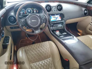 2016 Jaguar XJ Portfolio with VIN SAJWA2G70G8V93006, listed as a Copart auction lot 52324635 with 123,690 mi miles and Salvage Title. Bid and sale history available at DreamBid. Image 8.