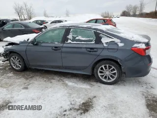 2024 Honda Civic Sedan EX with VIN 2HGFE2F32RH101348, listed as a Copart auction lot 43784045 with 23,153 mi miles and Salvage Title. Bid and sale history available at carsss.com. Image 2.