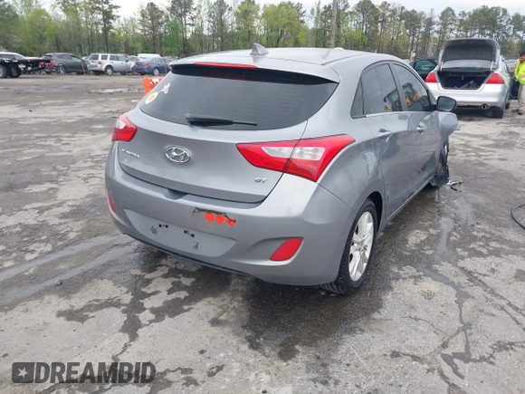 2013 Hyundai Elantra GT with VIN KMHD35LE1DU058318, listed as a IAAI auction lot 42036716 with 146,845 mi miles. Bid and sale history available at carsss.com. Image 4.