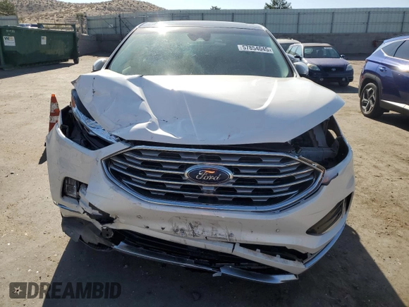 2019 Ford Edge Titanium z VIN 2FMPK3K99KBC62750, wystawiony jako Copart lot #57854045 z przebiegiem 57 327 mil mil oraz Szkoda całkowita • Salvage title. Historia ofert i sprzedaży dostępna na DreamBid. Obrazek 5.