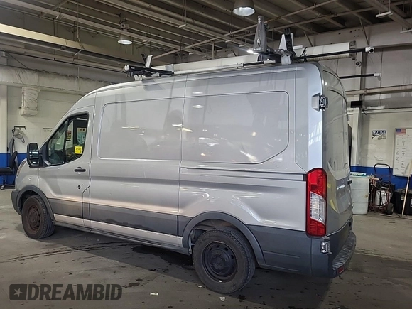 2016 Ford Transit Cargo with VIN 1FTYE1CM3GKB49266, listed as a IAAI auction lot 42666703 with 122,037 mi miles and . Bid and sale history available at DreamBid. Image 32.