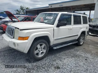 2010 Jeep Commander Sport with VIN 1J4RH4GKXAC114855, listed as a Copart auction lot 56670485 with 164,996 mi miles and Salvage title. Bid and sale history available at DreamBid. Image 1.