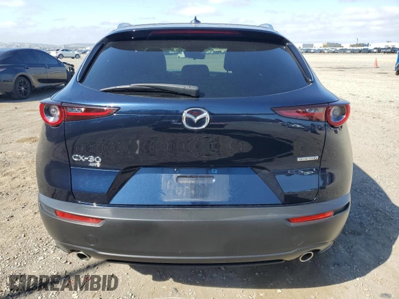 2023 Mazda CX-30 S Premium with VIN 3MVDMBDM7PM543849, listed as a Copart auction lot 54852415 with 20,898 mi miles and Salvage title. Bid and sale history available at DreamBid. Image 6.