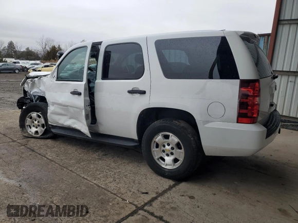 2012 Chevrolet Tahoe Commercial with VIN 1GNSK2E03CR163577, listed as a Copart auction lot 84611234 with 98,056 mi miles and Salvage title. Bid and sale history available at DreamBid. Image 2.