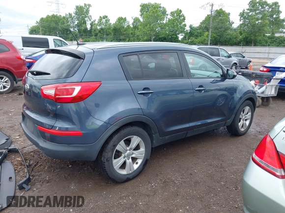 2013 Kia Sportage LX with VIN KNDPB3A26D7452008, listed as a IAAI auction lot 42435597 with 109,397 mi miles and . Bid and sale history available at DreamBid. Image 4.
