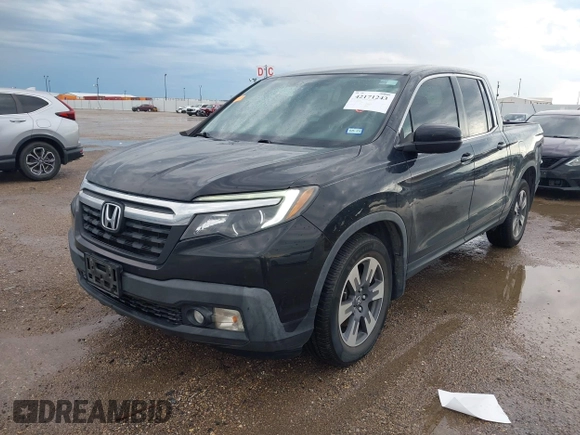 2017 Honda Ridgeline RTL-T with VIN 5FPYK2F64HB003542, listed as a IAAI auction lot 42171243 with 102,071 mi miles and . Bid and sale history available at DreamBid. Image 2.