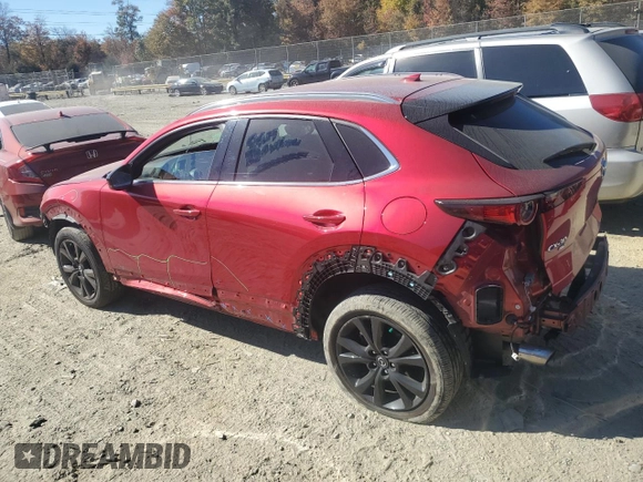 2021 Mazda CX-30 Premium with VIN 3MVDMBDY0MM312354, listed as a Copart auction lot 77112334 with 47,351 mi miles and Salvage Title. Bid and sale history available at carsss.com. Image 2.