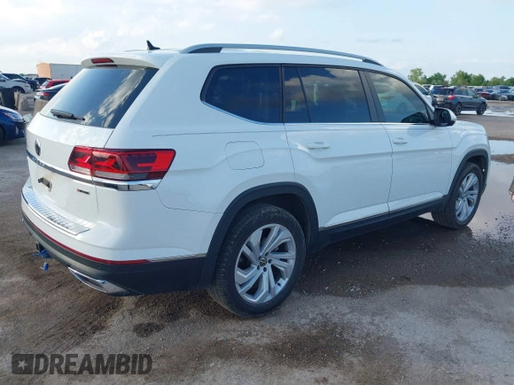 2021 Volkswagen Atlas SEL with VIN 1V2BR2CAXMC522670, listed as a IAAI auction lot 42110724 with 58,802 mi miles and . Bid and sale history available at DreamBid. Image 4.