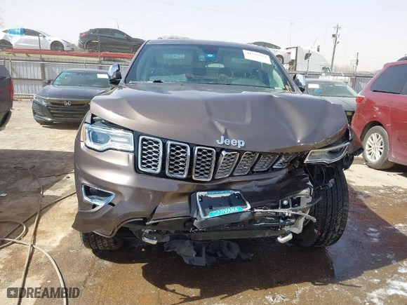 2020 Jeep Grand Cherokee Overland with VIN 1C4RJECG8LC323824, listed as a IAAI auction lot 41757922 with 64,792 mi miles. Bid and sale history available at carsss.com. Image 13.