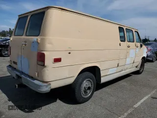1992 GMC Vandura z VIN 2GTGG39K7N4508329, wystawiony jako Copart lot #56752215 z przebiegiem 248 713 mil mil oraz Tytuł czysty. Historia ofert i sprzedaży dostępna na DreamBid. Obrazek 3.