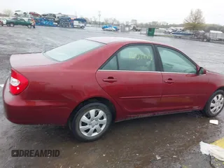 2004 Toyota Camry LE with VIN 4T1BE32K04U314445, listed as a IAAI auction lot 42017413 with 137,702 mi miles. Bid and sale history available at carsss.com. Image 14.
