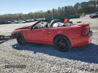 2002 Ford Mustang GT Deluxe z VIN 1FAFP45X62F237388, wystawiony jako Copart lot #50299965 z przebiegiem Nie podano mil oraz Szkoda całkowita • Salvage title. Historia ofert i sprzedaży dostępna na DreamBid. Obrazek 2.