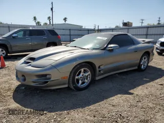 2001 Pontiac Firebird Formula z VIN 2G2FV22G312118842, wystawiony jako Copart lot #52308045 z przebiegiem 124 059 mil mil oraz Szkoda całkowita • Salvage title. Historia ofert i sprzedaży dostępna na DreamBid. Obrazek 1.